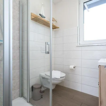 Strandhaus-4-eg דירה